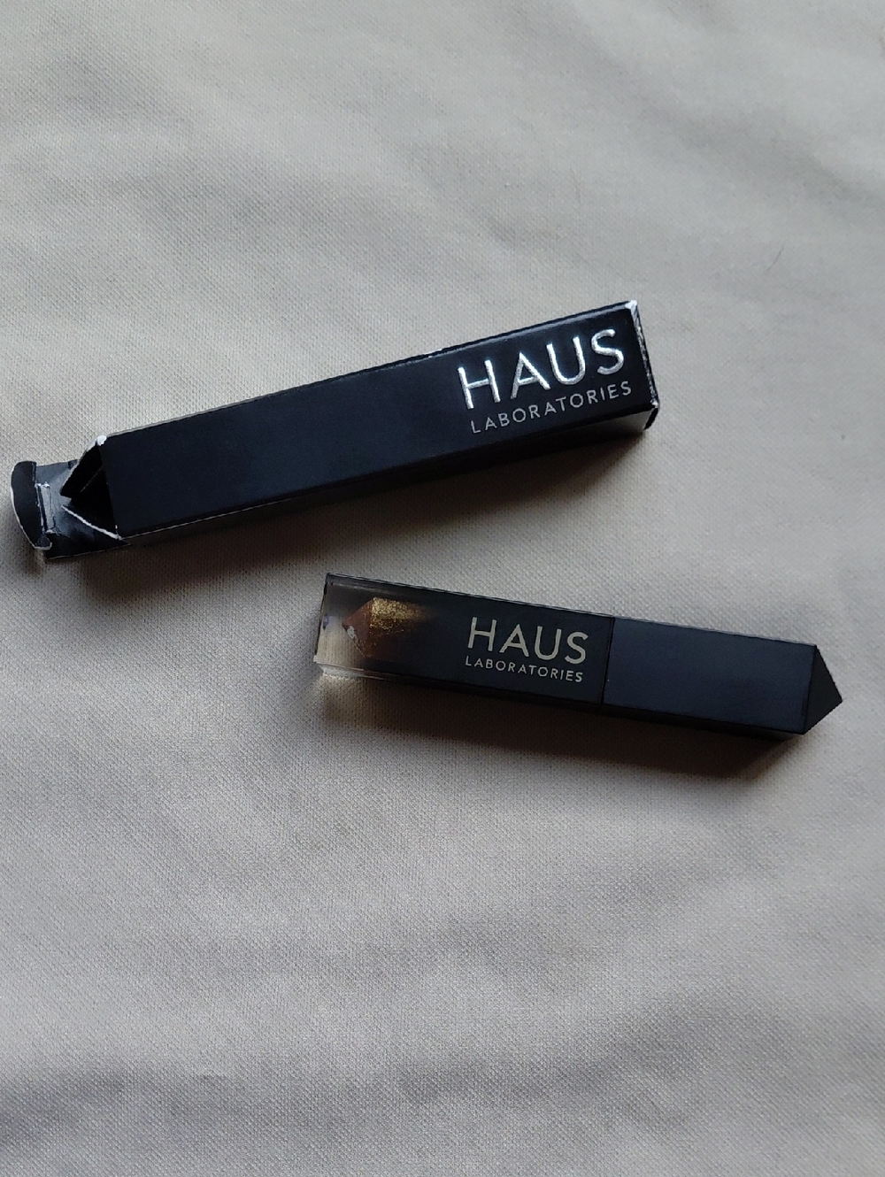 HAUS Laboratories Glam Attack All Over Liquid Shimmer Powder In Legend Gold